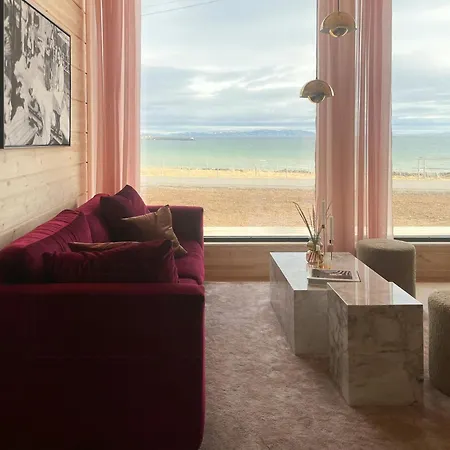 Design By The Sea With Northern Lights